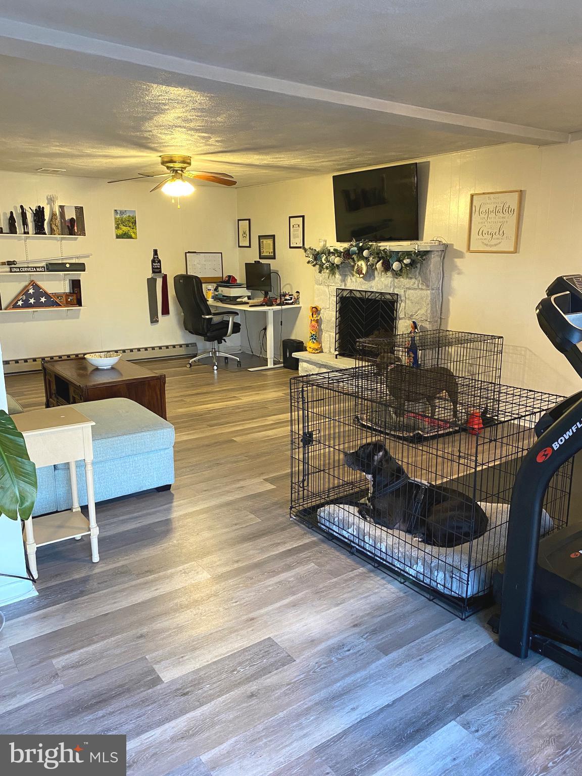 847 Rivendell Lane Pottstown, PA 19464 - Photo 26 of 41 a living room with furniture and a flat screen tv