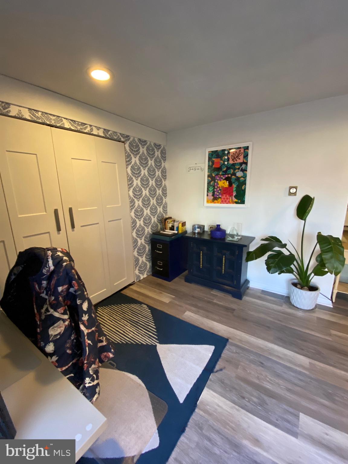 847 Rivendell Lane Pottstown, PA 19464 - Photo 28 of 41 a living room with furniture and a flat screen tv