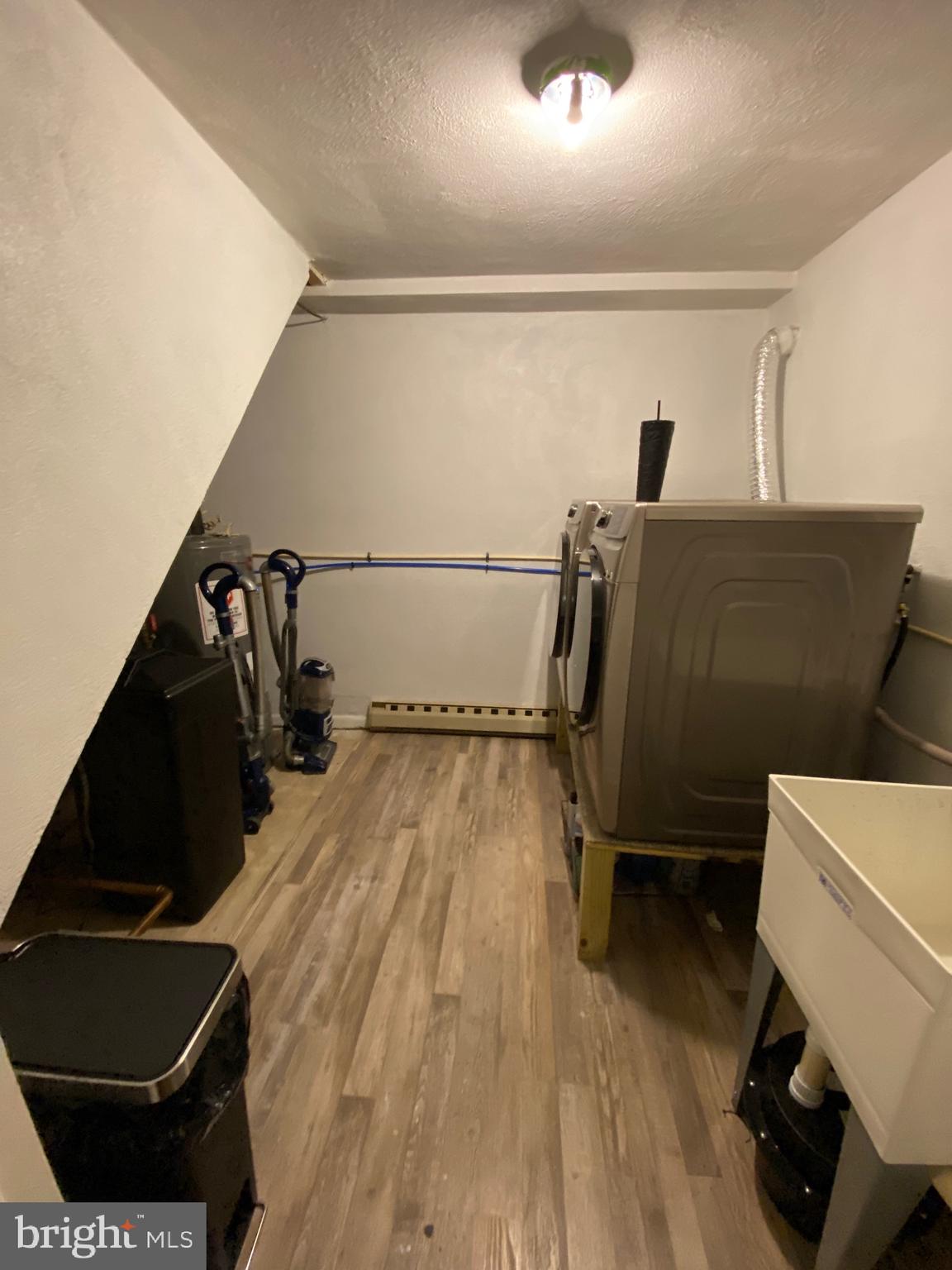 847 Rivendell Lane Pottstown, PA 19464 - Photo 31 of 41 a view of a room with wooden floor and windows