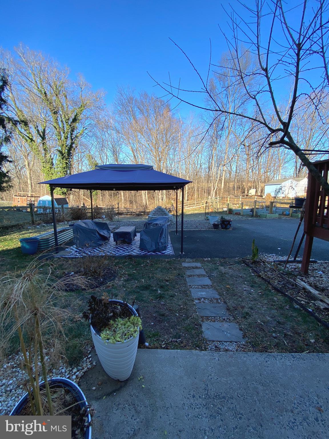 847 Rivendell Lane Pottstown, PA 19464 - Photo 38 of 41 a view of a backyard with plants and trees