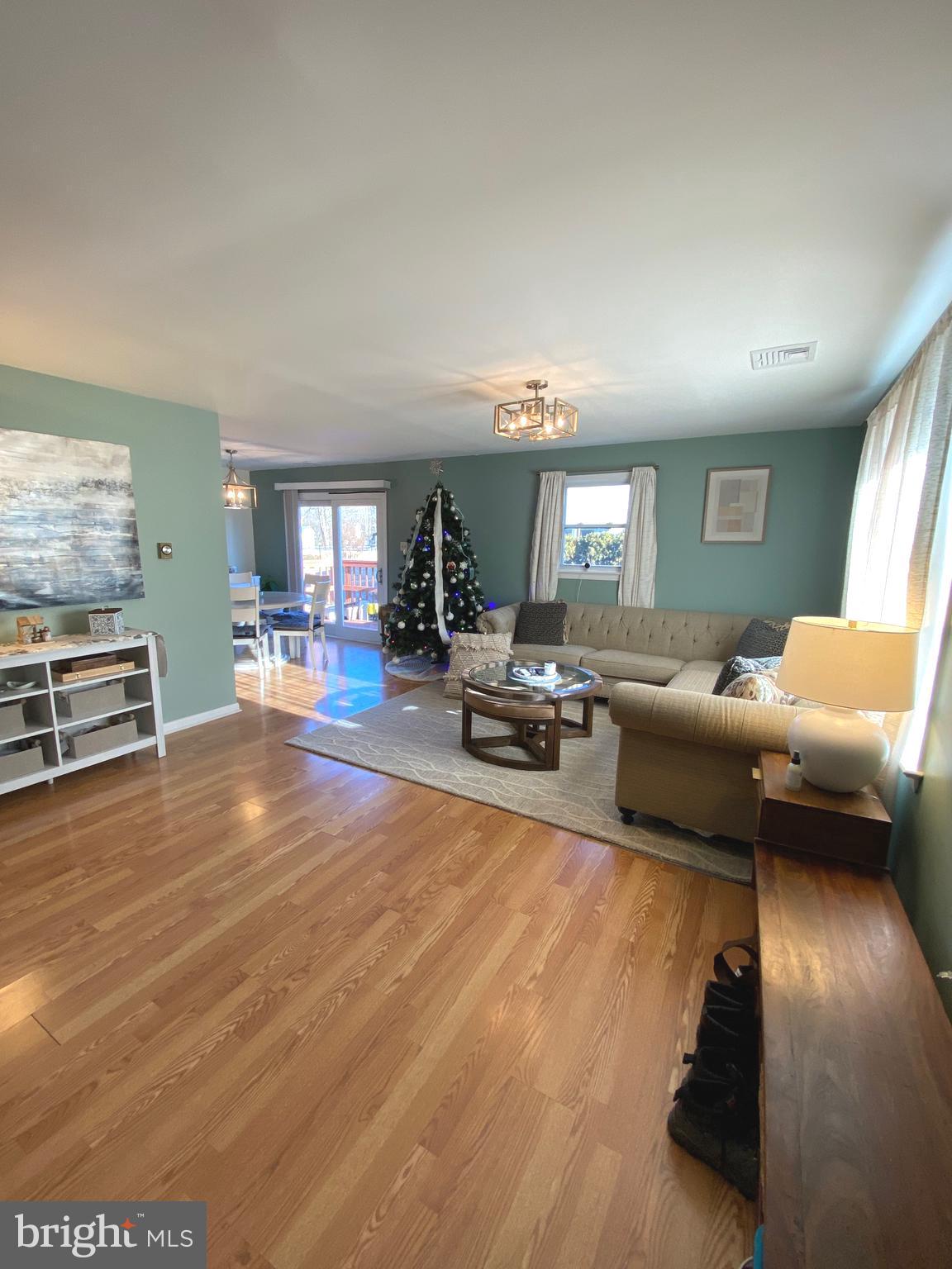 847 Rivendell Lane Pottstown, PA 19464 - Photo 4 of 41 a living room with furniture and a wooden floor