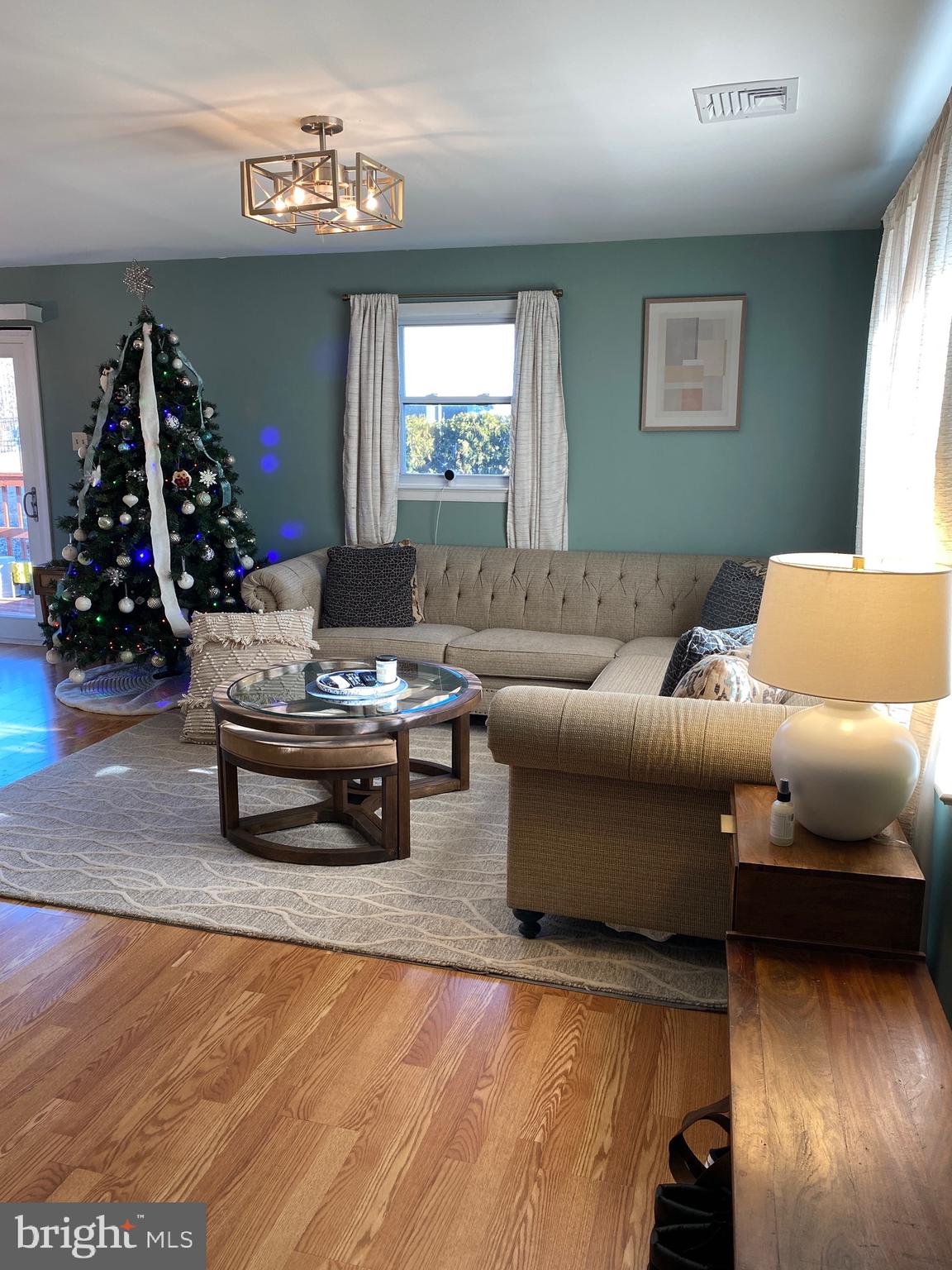 847 Rivendell Lane Pottstown, PA 19464 - Photo 7 of 41 a living room with furniture and a wooden floor