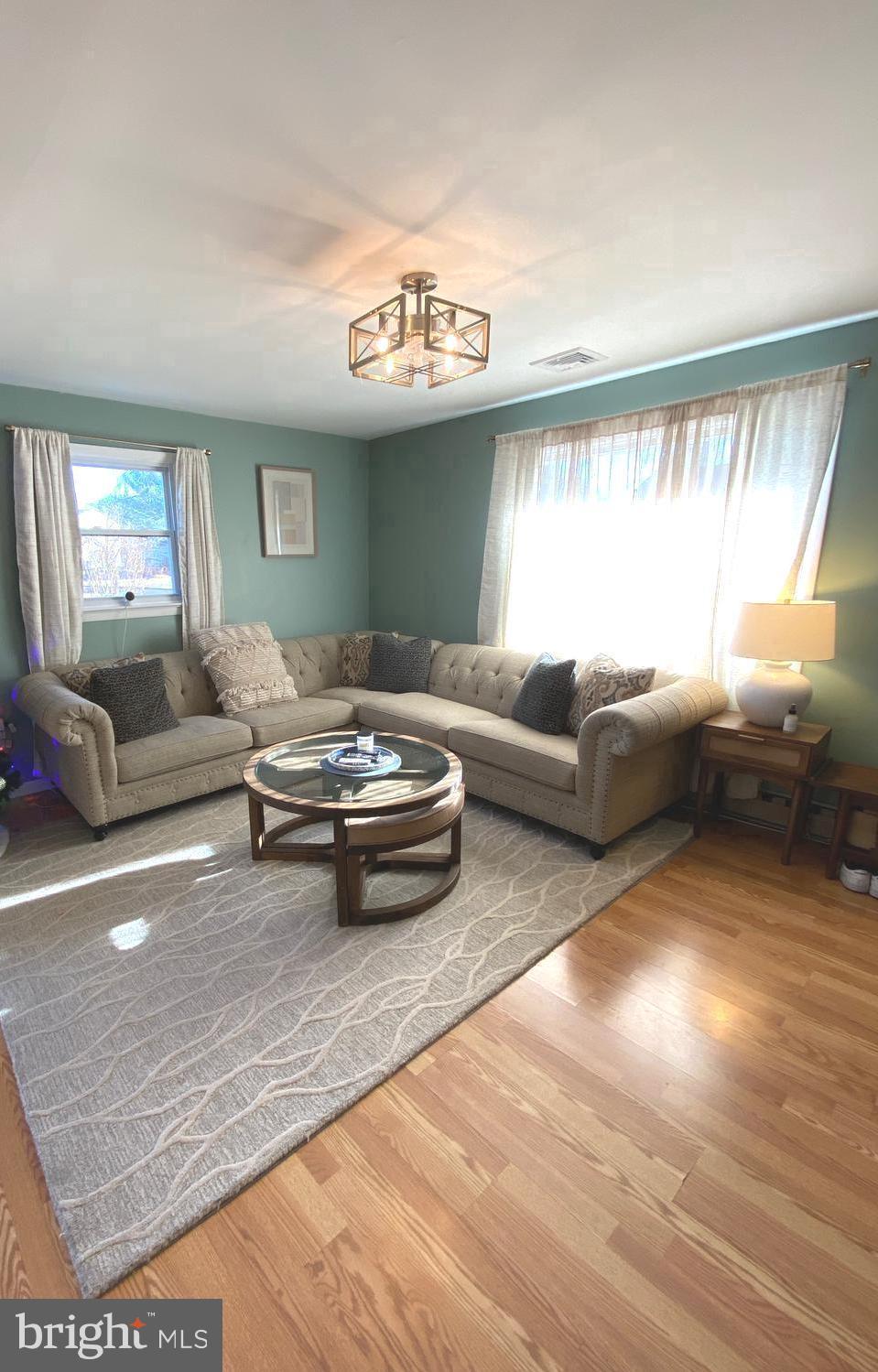 847 Rivendell Lane Pottstown, PA 19464 - Photo 8 of 41 a living room with furniture and a large window