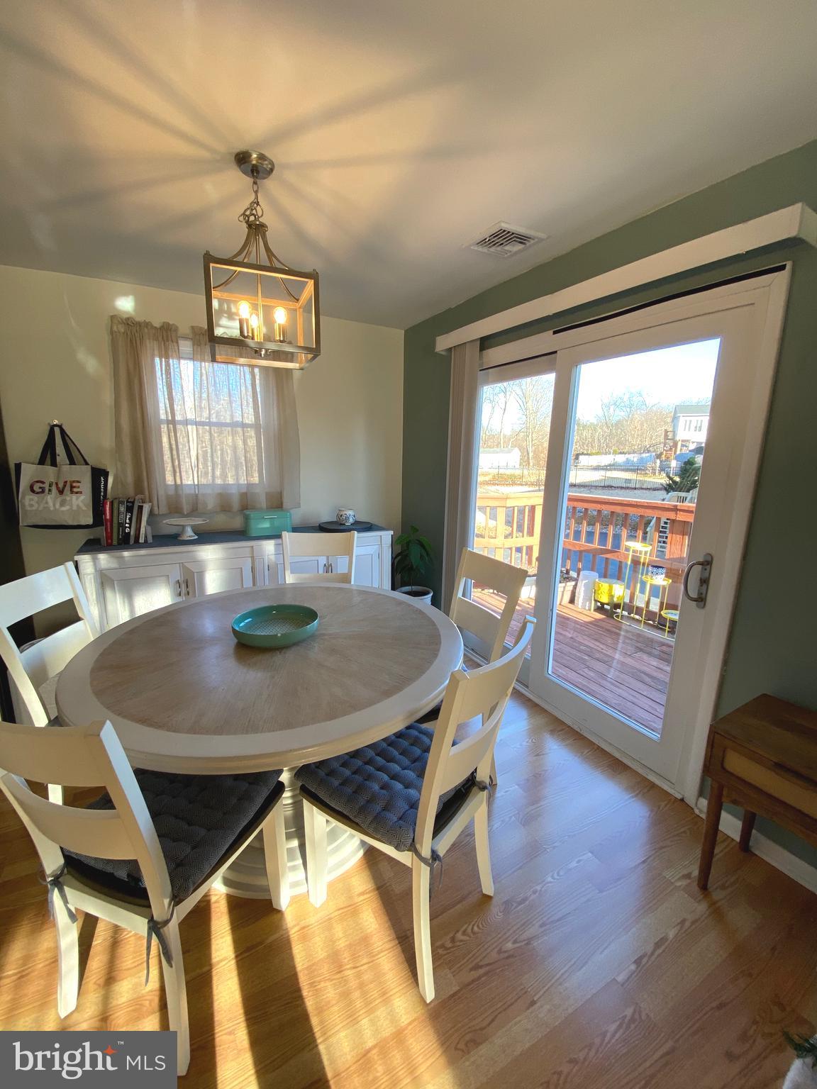 847 Rivendell Lane Pottstown, PA 19464 - Photo 9 of 41 a view of a dining room with furniture window and wooden floor