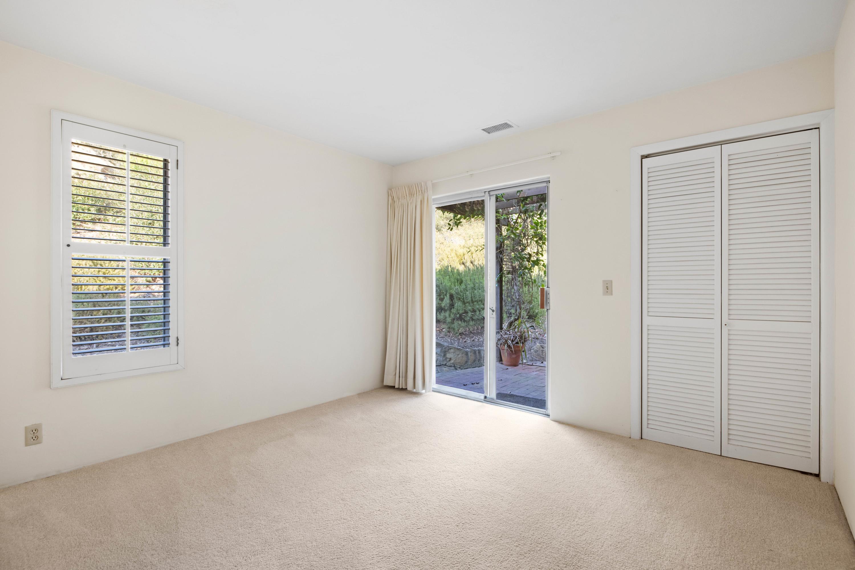 1986 Arriba Street Carpinteria, CA 93013 - Photo 20 of 27 a view of an empty room with a window
