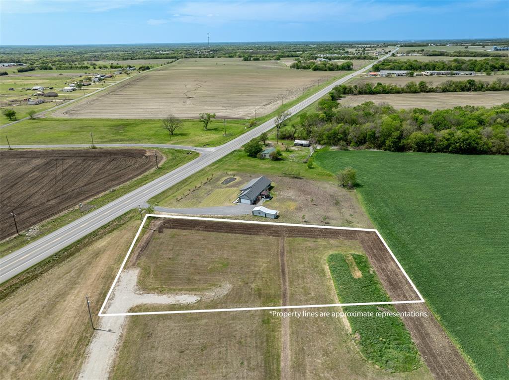 Lot 2 Mccartney Trail Whitewright, TX 75491 - Photo 3 of 6 a view of a swimming pool and a mountain view