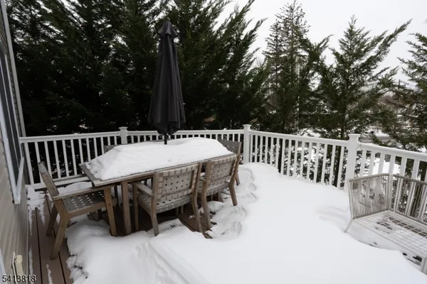 a view of a chairs and table in the patio