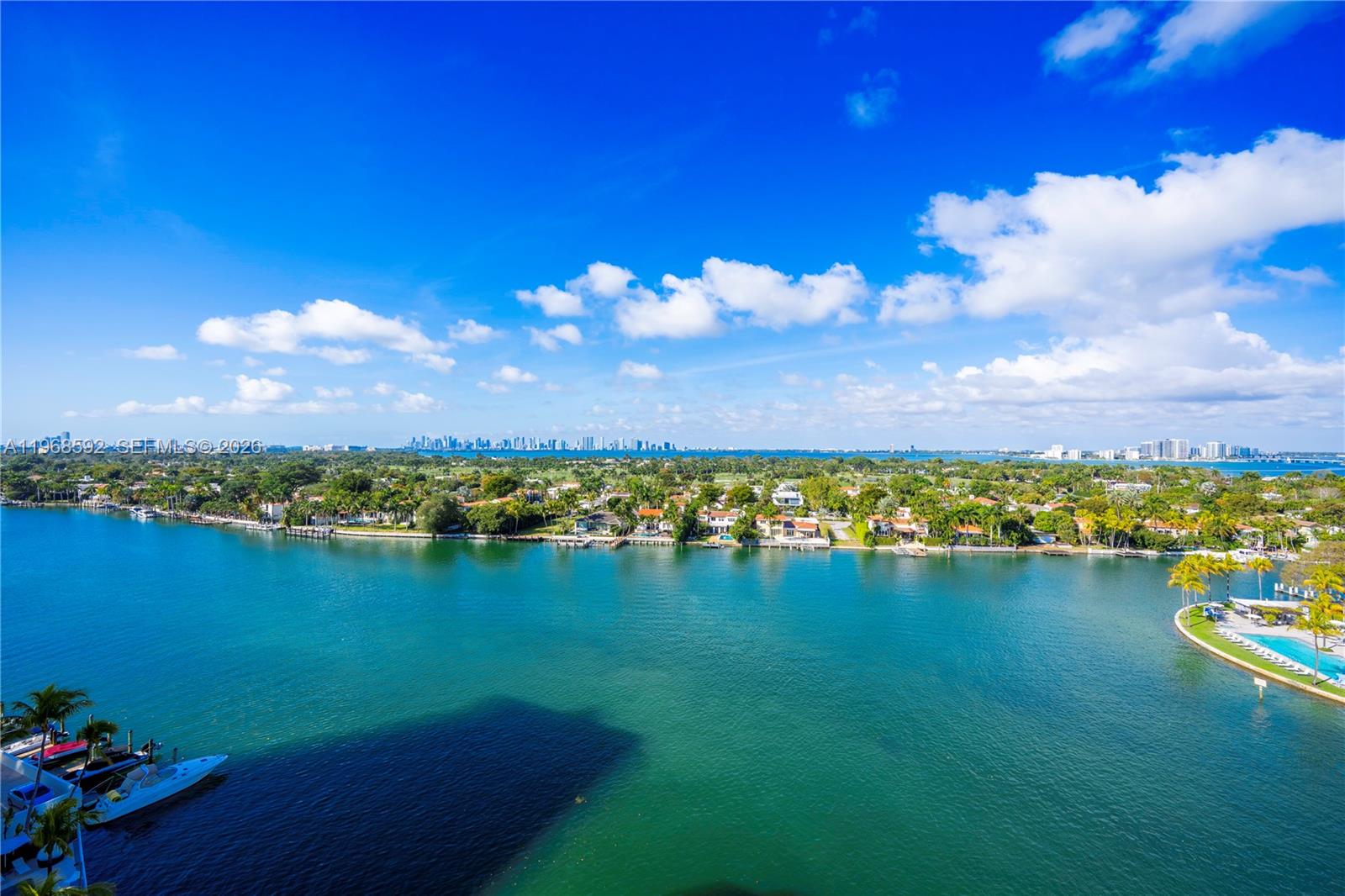 5900 Collins Avenue, Unit 1401 Miami Beach, FL 33140 - Photo 17 of 51 a view of a lake with a city