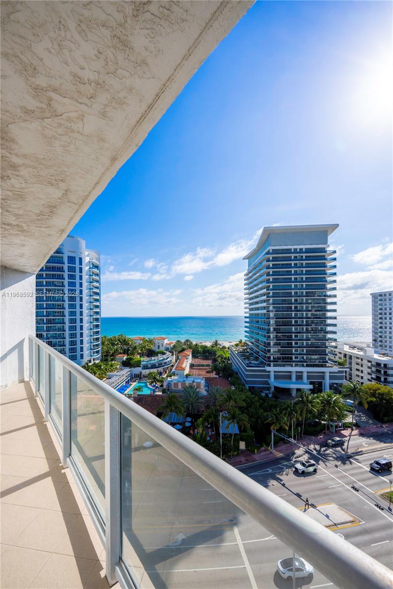 5900 Collins Avenue, Unit 1401 Miami Beach, FL 33140 - Photo 19 of 51 a view of balcony with potted plants