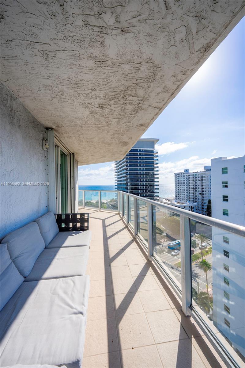 5900 Collins Avenue, Unit 1401 Miami Beach, FL 33140 - Photo 23 of 51 a view of a balcony