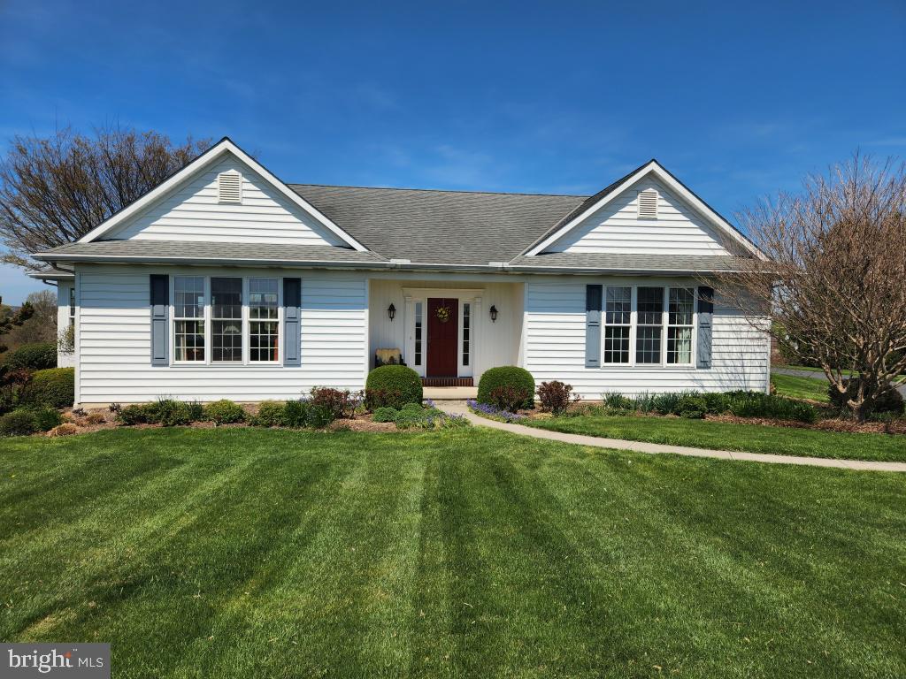 1043 Spring Valley Road Quarryville, PA 17566 - Photo 1 of 79 a front view of a house with a yard
