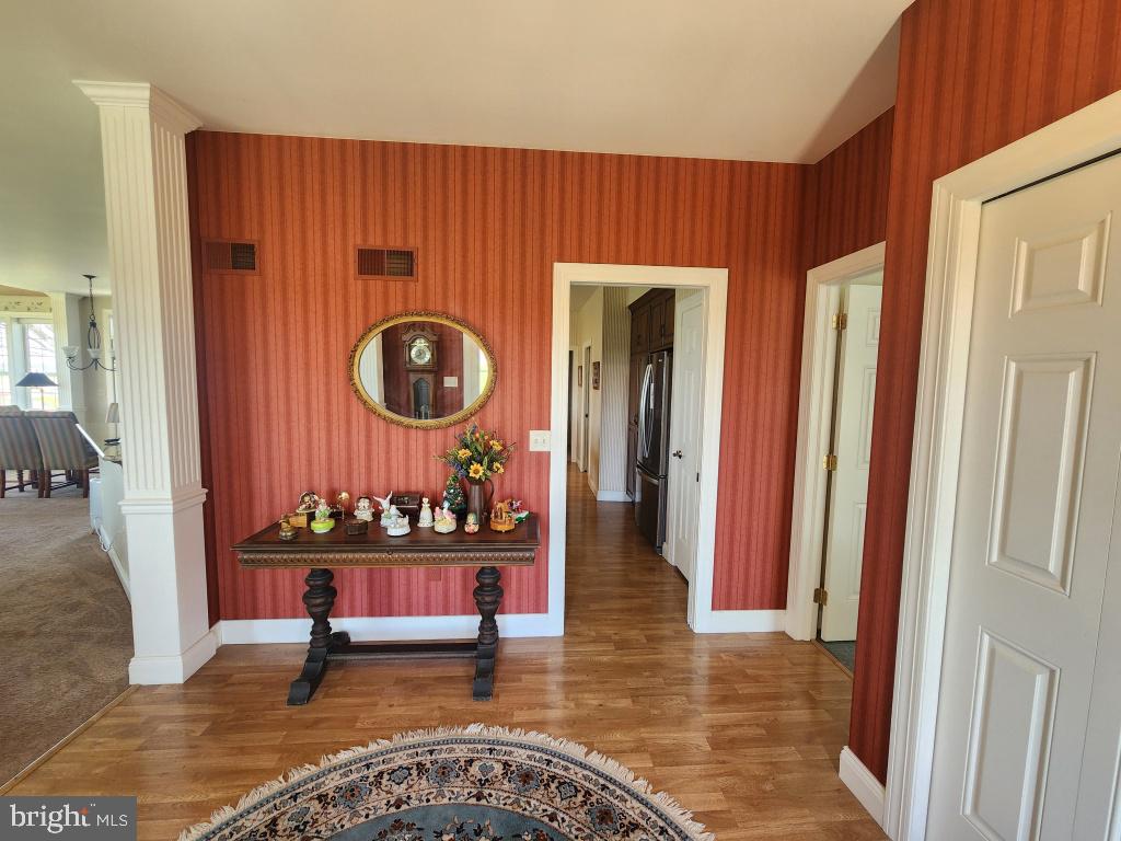 1043 Spring Valley Road Quarryville, PA 17566 - Photo 13 of 79 a living room with furniture and a mirror