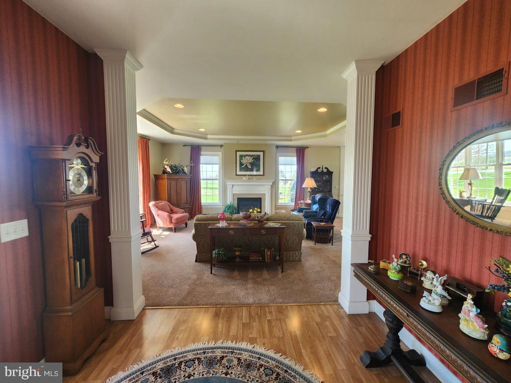 1043 Spring Valley Road Quarryville, PA 17566 - Photo 14 of 79 a living room with furniture and a wooden floor