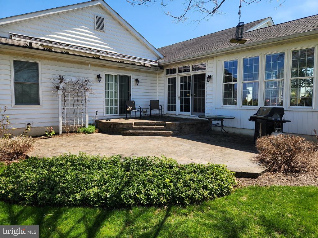 1043 Spring Valley Road Quarryville, PA 17566 - Photo 2 of 79 a front view of a house with a yard outdoor seating and garage