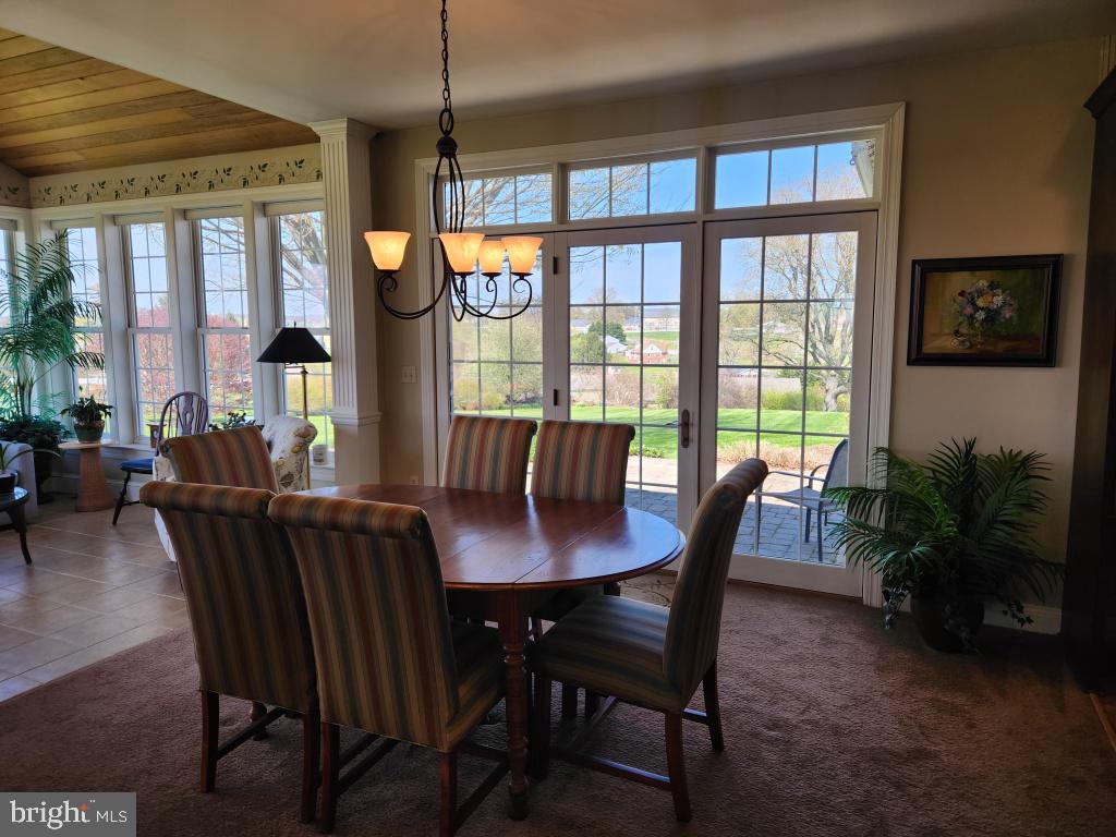 1043 Spring Valley Road Quarryville, PA 17566 - Photo 24 of 79 a view of a dining room with furniture window and outside view