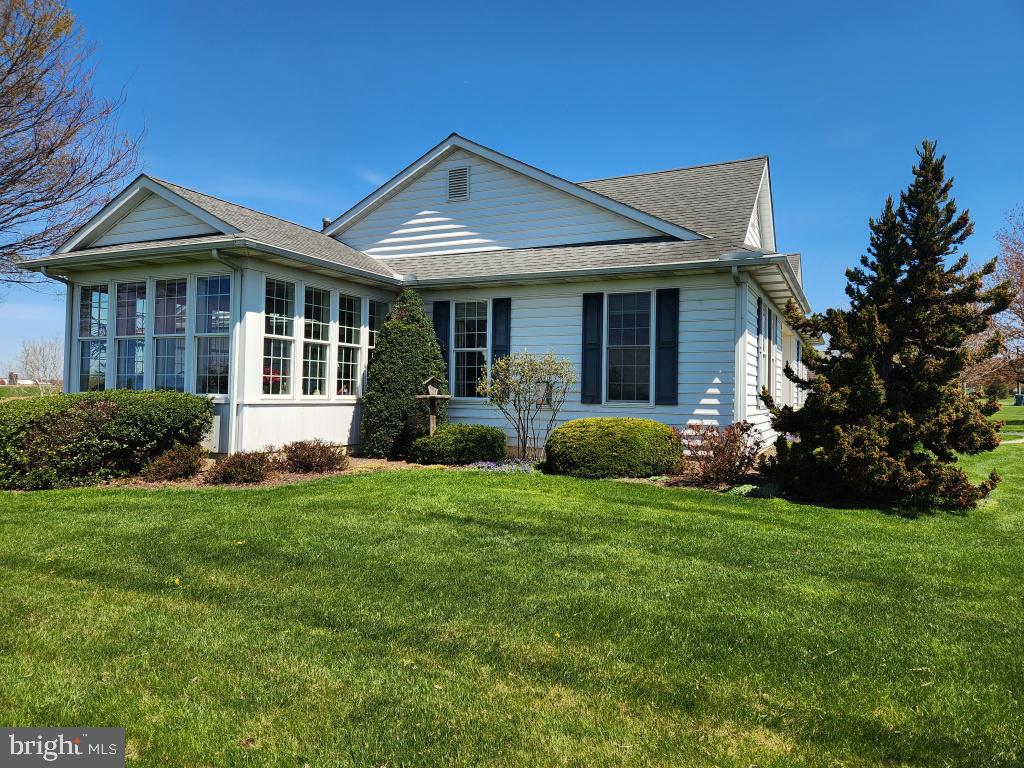 1043 Spring Valley Road Quarryville, PA 17566 - Photo 5 of 79 a view of a house with garden and yard