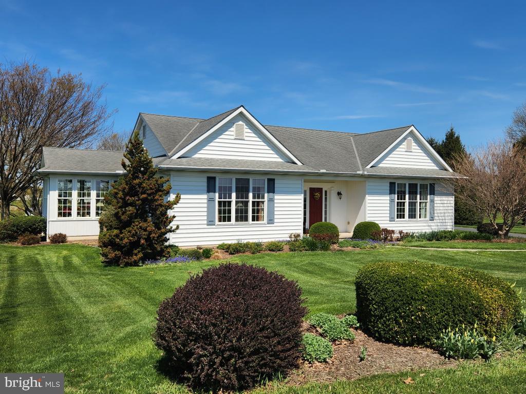 1043 Spring Valley Road Quarryville, PA 17566 - Photo 6 of 79 a front view of a house with a yard