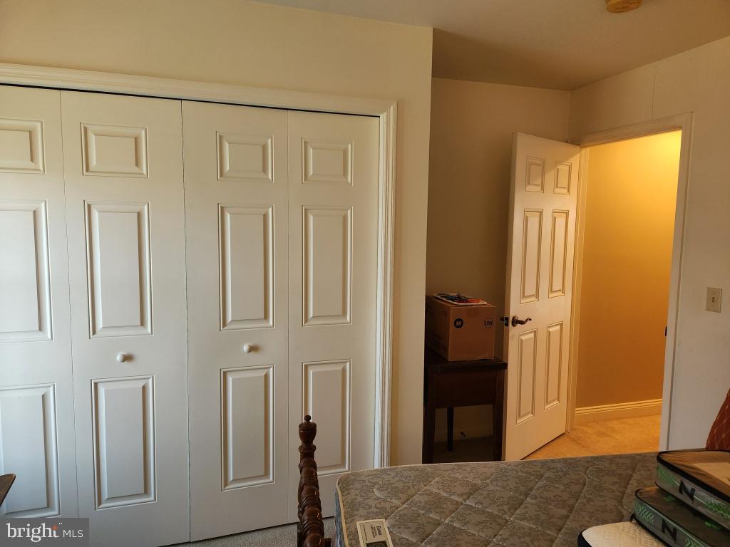 1043 Spring Valley Road Quarryville, PA 17566 - Photo 61 of 79 a bedroom with a bed and wooden floor