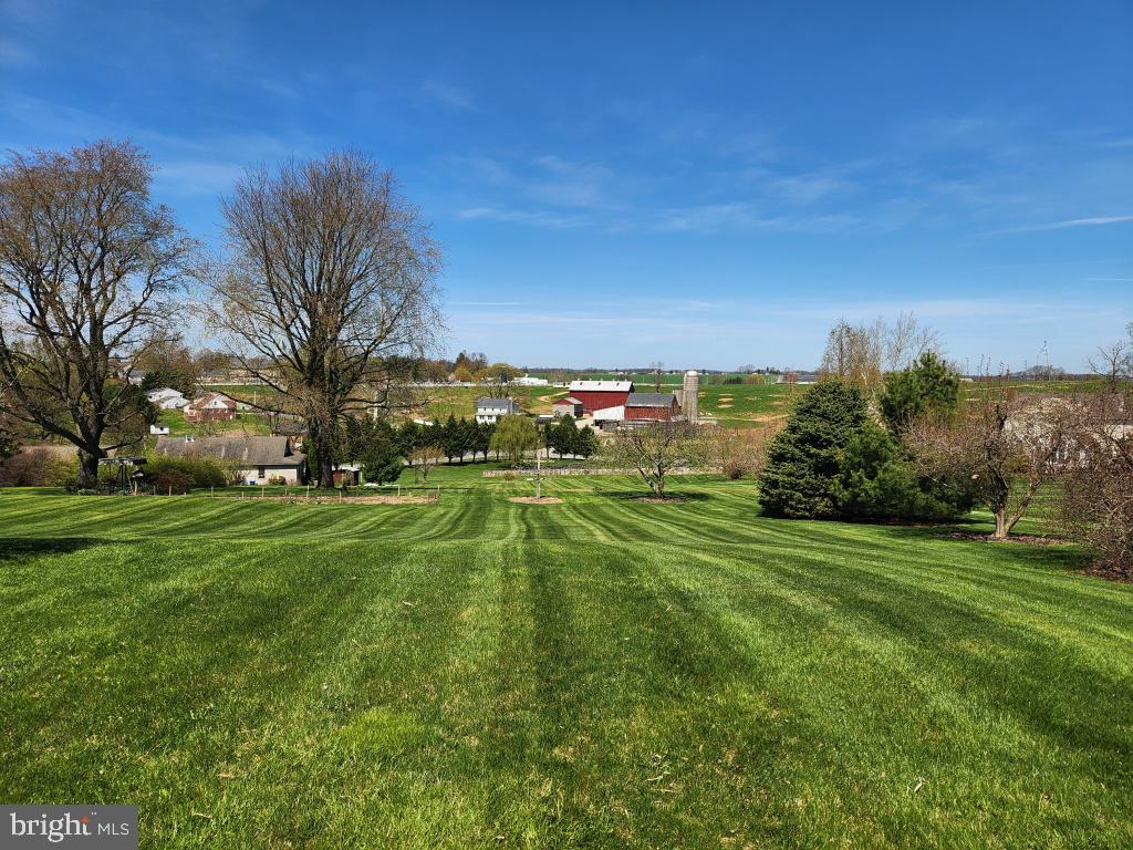 1043 Spring Valley Road Quarryville, PA 17566 - Photo 71 of 79 a view of a field with grass and trees
