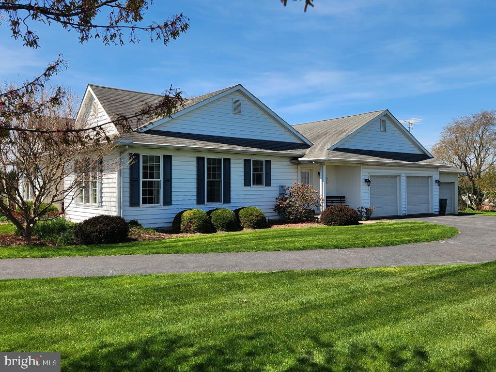 1043 Spring Valley Road Quarryville, PA 17566 - Photo 8 of 79 a front view of a house with a yard