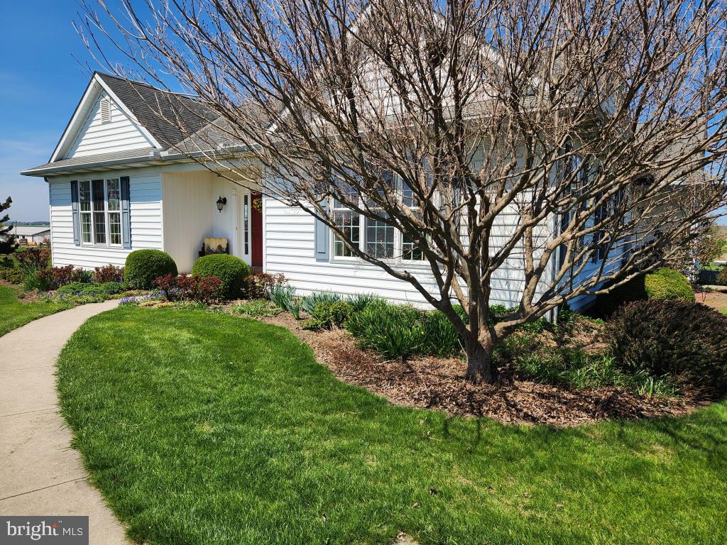 1043 Spring Valley Road Quarryville, PA 17566 - Photo 9 of 79 a front view of a house with a yard