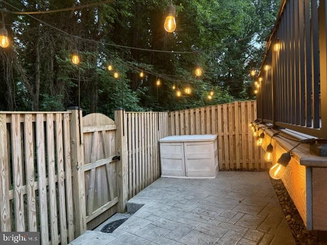 1016 Windrush Lane, Unit 25 Sandy Spring, MD 20860 - Photo 12 of 37 Patio with warm lights