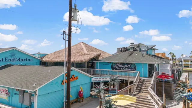 a front view of a house with parking area