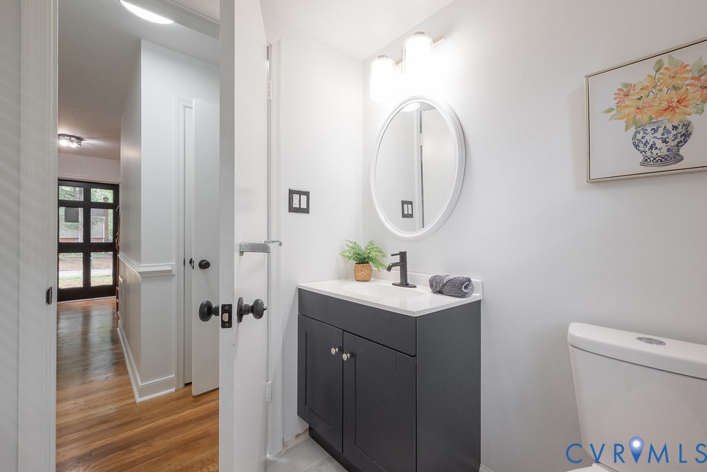 11840 Winfore Drive Midlothian, VA 23113 - Photo 13 of 40 Bathroom featuring a dark wood-finish vanity with