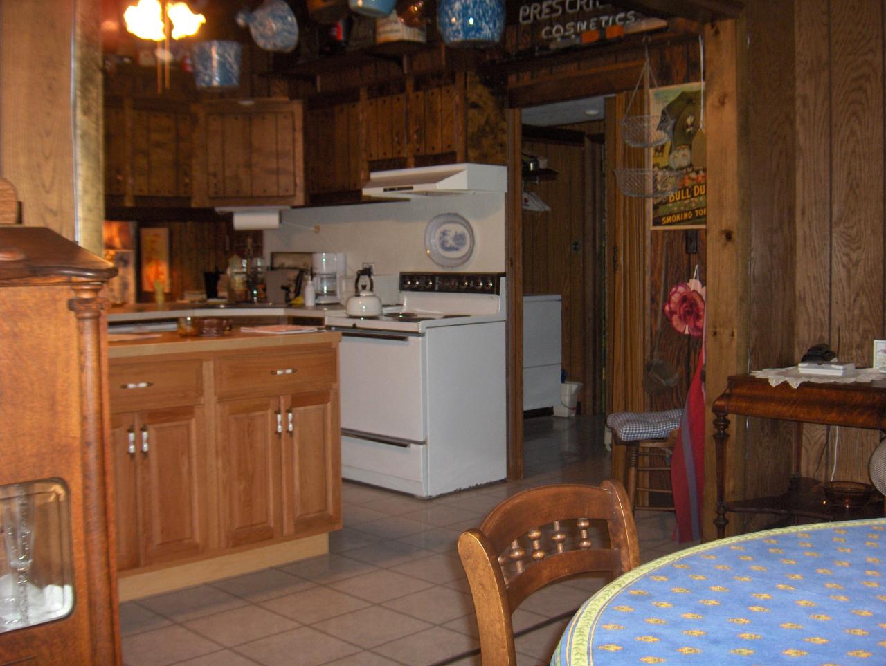 402 Big Oak Road Canadensis, PA 18325 - Photo 6 of 18 a kitchen with stainless steel appliances granite countertop a sink stove and refrigerator