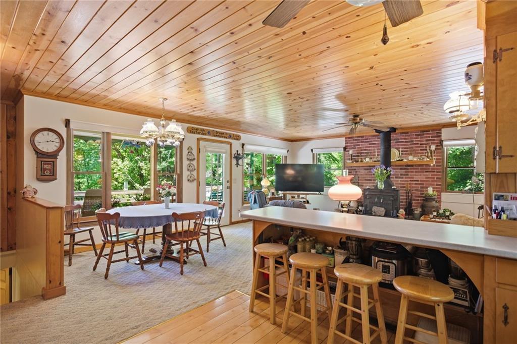 46 Spartan Lane Rabun Gap, GA 30568 - Photo 18 of 89 a view of a dining room with furniture window and outside view