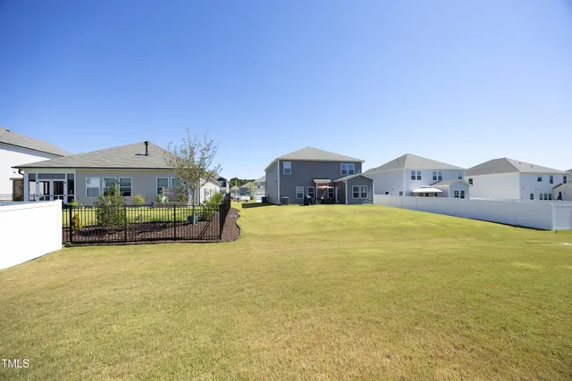 a front view of a building with swimming pool