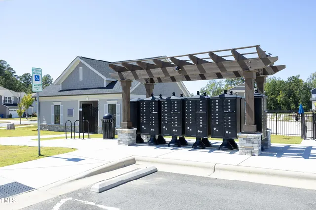 a view of a house with a iron gate