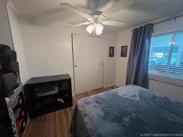 8709 Knight Road Boynton Beach, FL 33436 - Photo 23 of 39 a bedroom with a bed and a chandelier