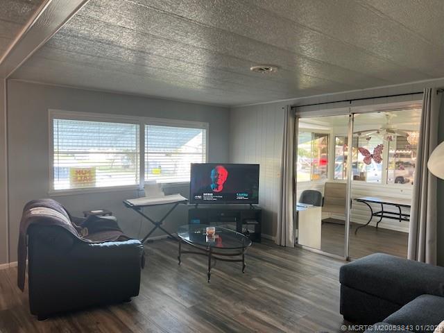 8709 Knight Road Boynton Beach, FL 33436 - Photo 3 of 39 a living room with furniture and a large window