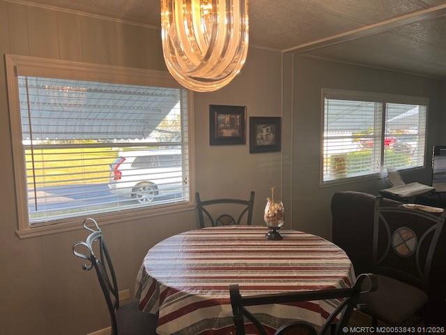 8709 Knight Road Boynton Beach, FL 33436 - Photo 6 of 39 a view of a dining room with furniture window and outside view