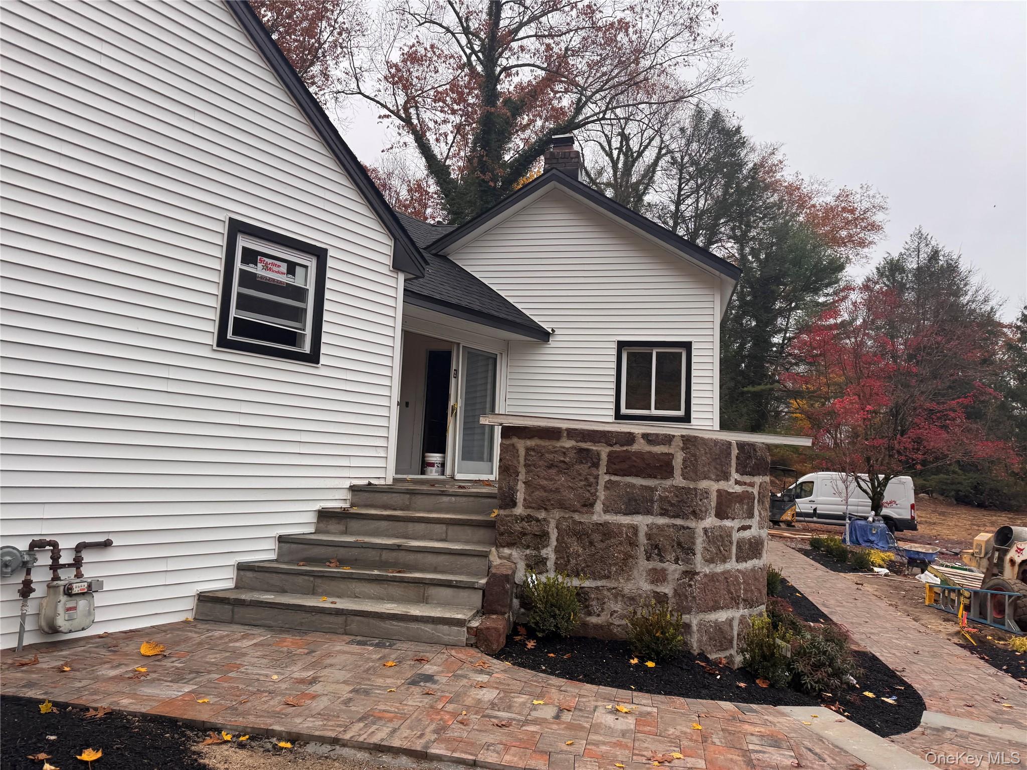 263 South Mountain Road New City, NY 10956 - Photo 4 of 33 Property entrance with stone siding and a chimney