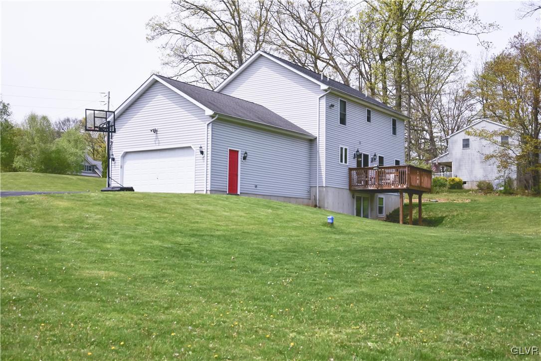 968 Renaldi Road Wind Gap, PA 18091 - Photo 2 of 18 a view of a house with a yard and sitting area
