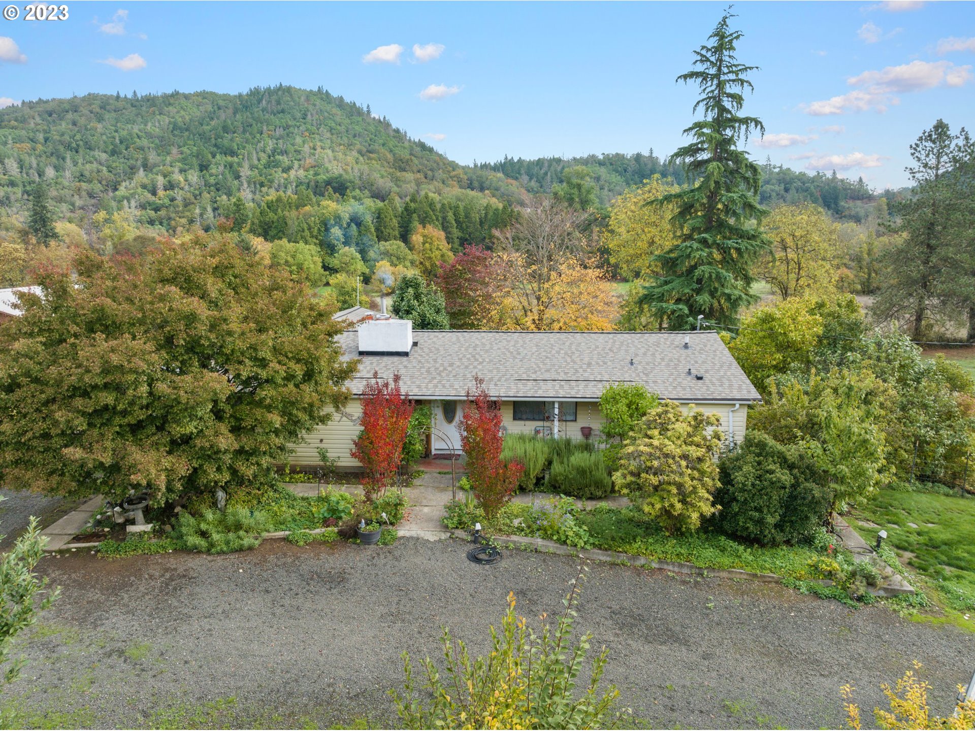 4235 Canyonville-Riddle Road Riddle, OR 97469 - Photo 2 of 38 an aerial view of a house