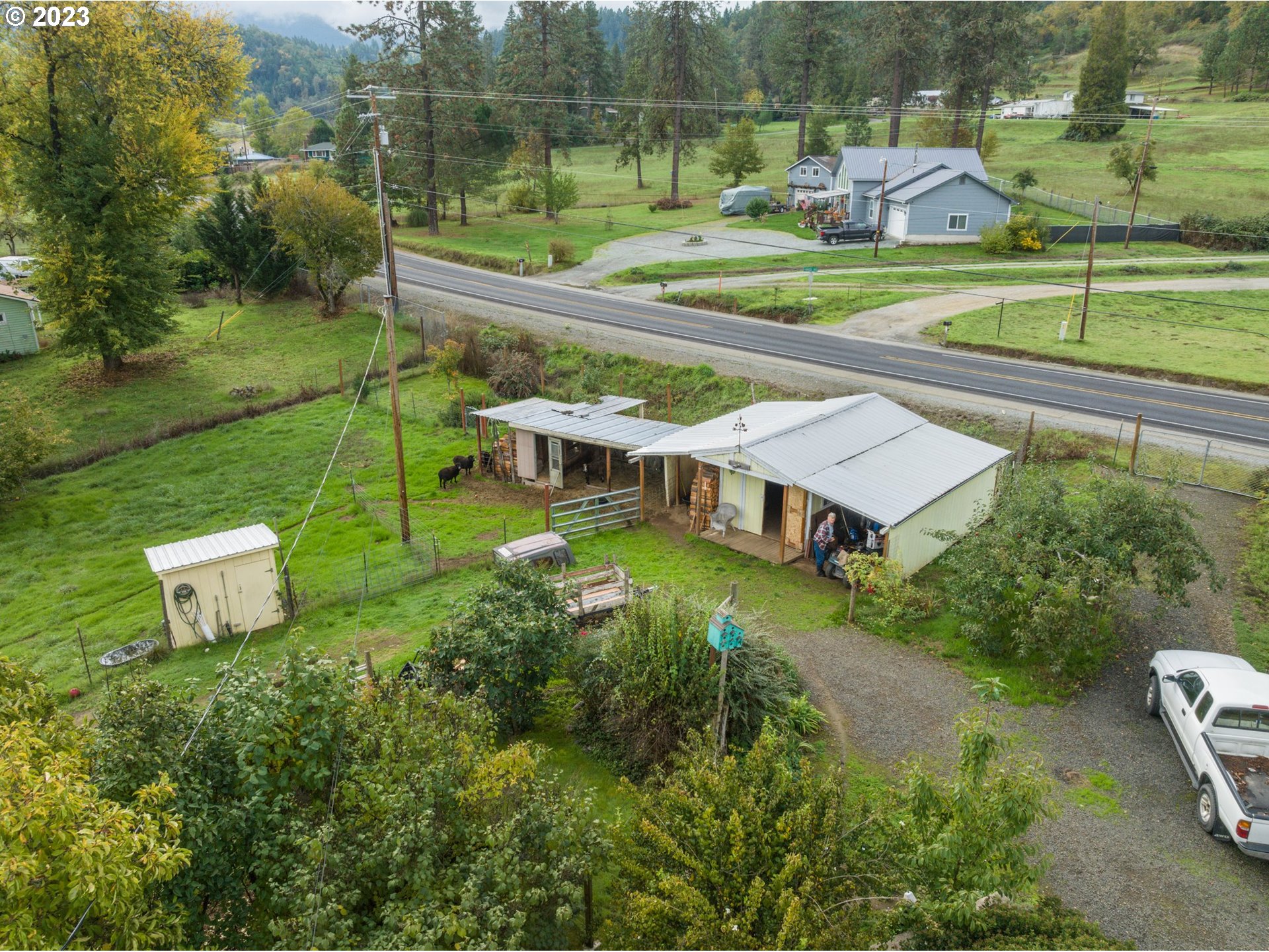 4235 Canyonville-Riddle Road Riddle, OR 97469 - Photo 29 of 38 an aerial view of a house with a yard
