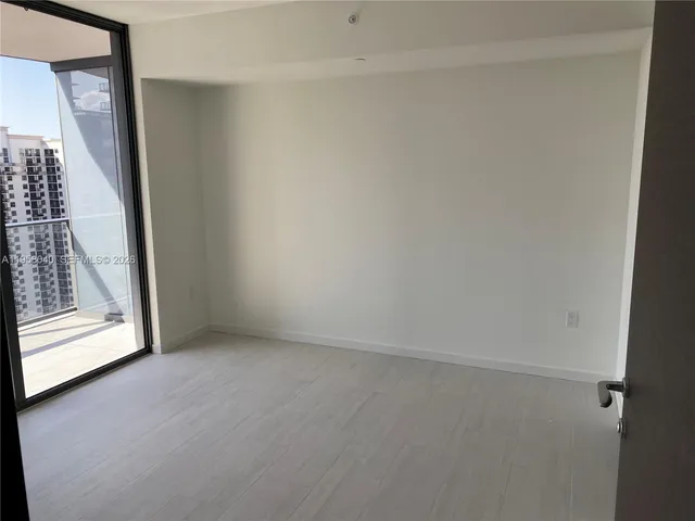 a view of an empty room with window