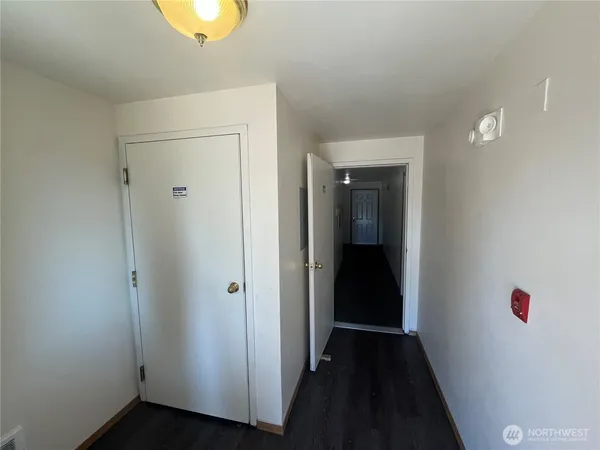 an empty room with a door