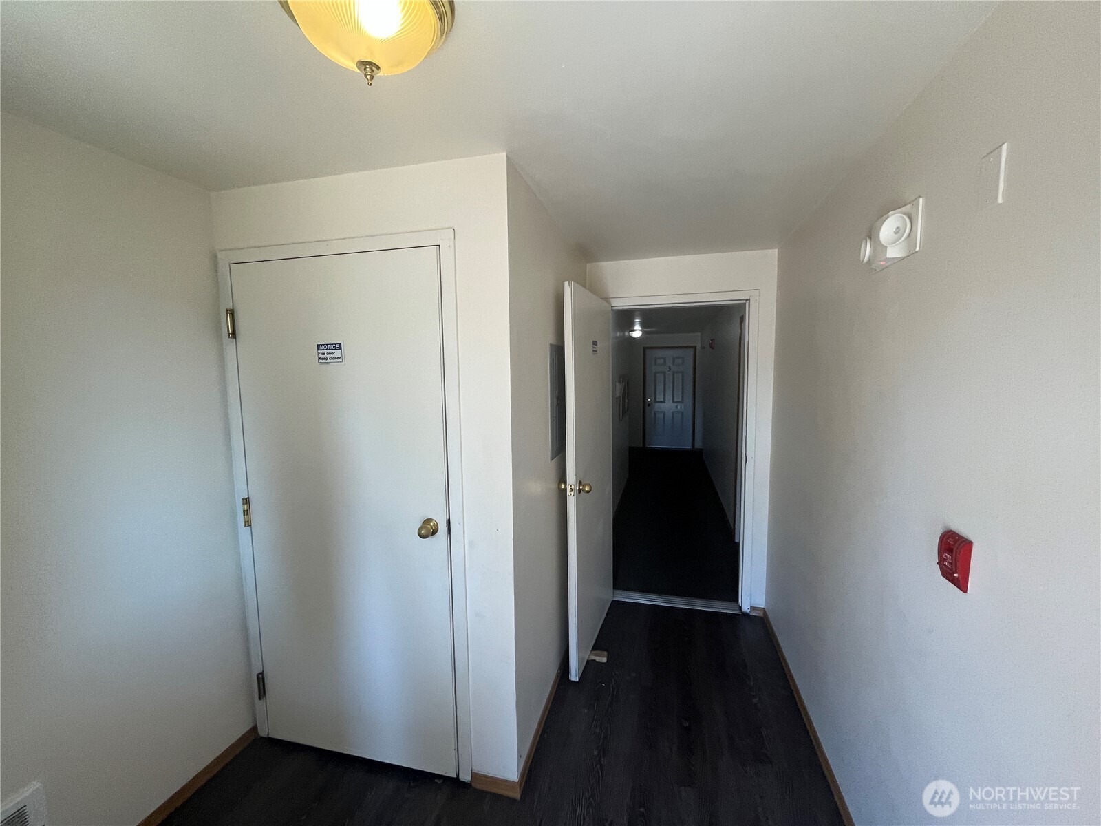 8830 Nesbit Avenue North Seattle, WA 98103 - Photo 27 of 32 a view of a hallway