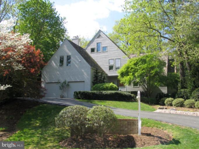 11591 Greenwich Point Road Reston, VA 20194 - Photo 1 of 30 a front view of a house with garden