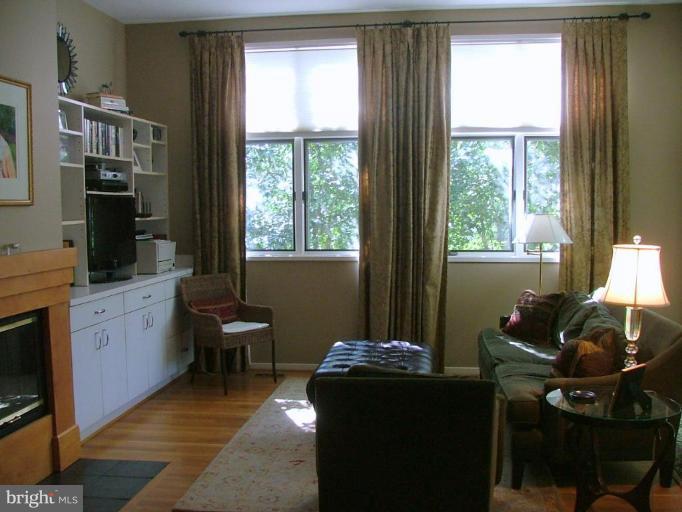 11591 Greenwich Point Road Reston, VA 20194 - Photo 15 of 30 a view of a workspace with furniture and a window