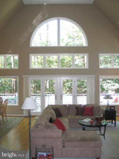 11591 Greenwich Point Road Reston, VA 20194 - Photo 3 of 30 a living room with furniture and a large window