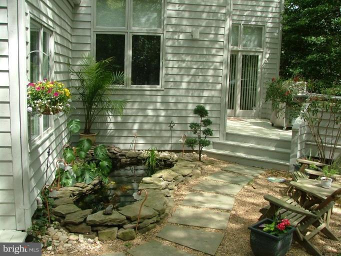 11591 Greenwich Point Road Reston, VA 20194 - Photo 21 of 30 a view of a backyard with plants