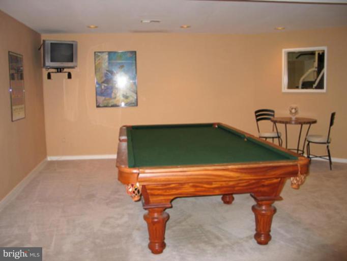 11591 Greenwich Point Road Reston, VA 20194 - Photo 23 of 30 a room with pool table and windows