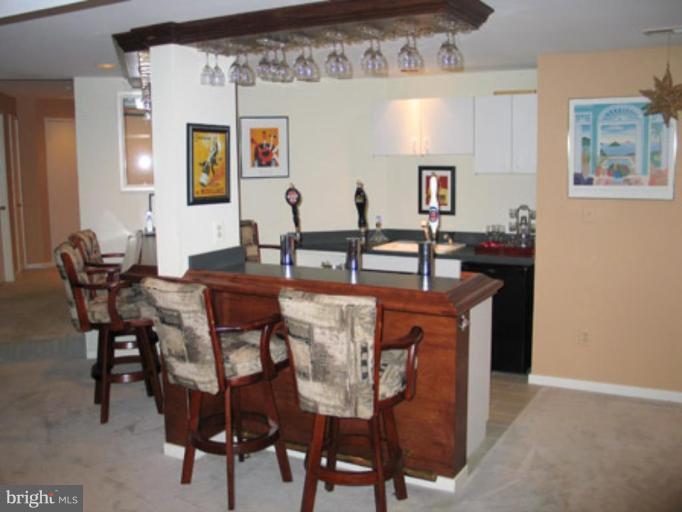 11591 Greenwich Point Road Reston, VA 20194 - Photo 25 of 30 a view of a dining room with furniture