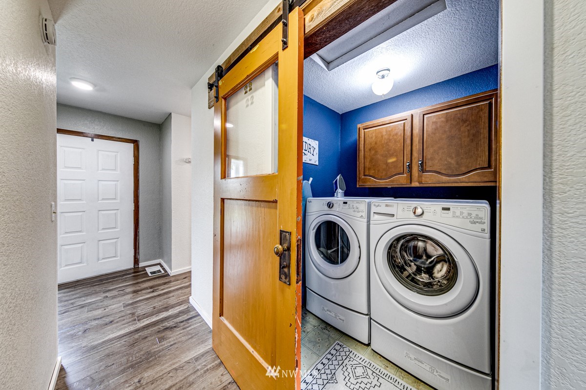 155 Taylor Cutoff Road Sequim, WA 98382 - Photo 12 of 37 a utility room with dryer and washer