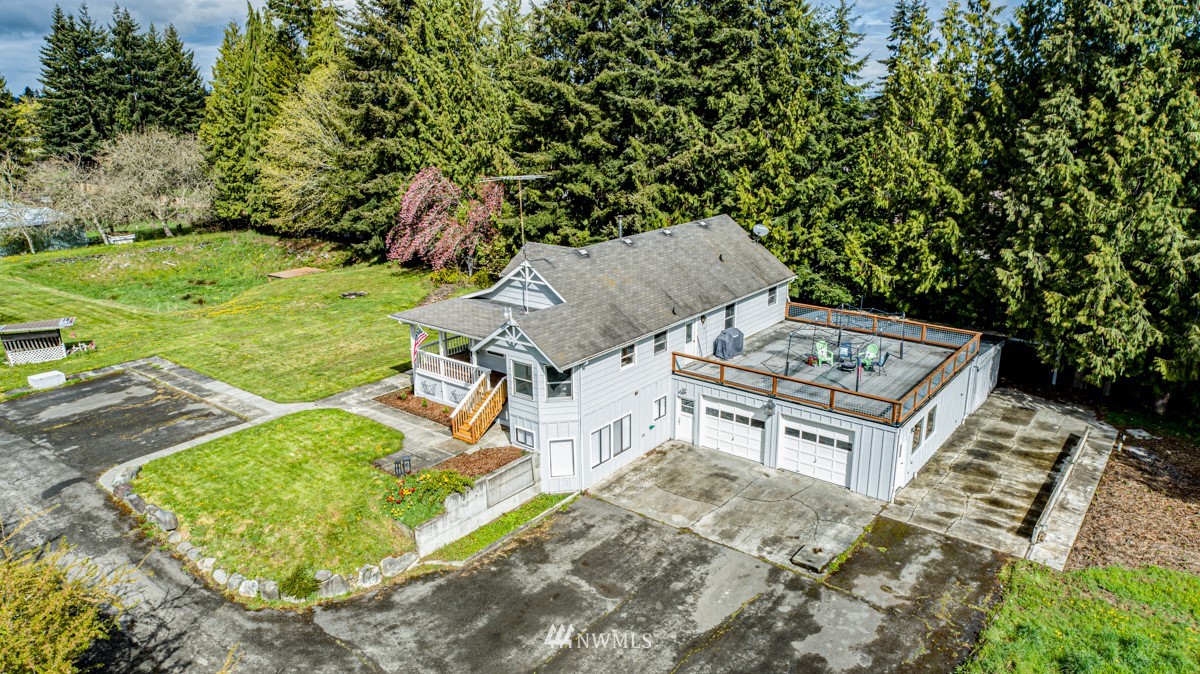 155 Taylor Cutoff Road Sequim, WA 98382 - Photo 28 of 37 an aerial view of a house with garden space